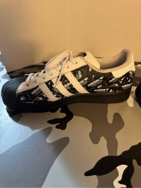 adidas mens Black and White Patterned Superstar Sneakers legit